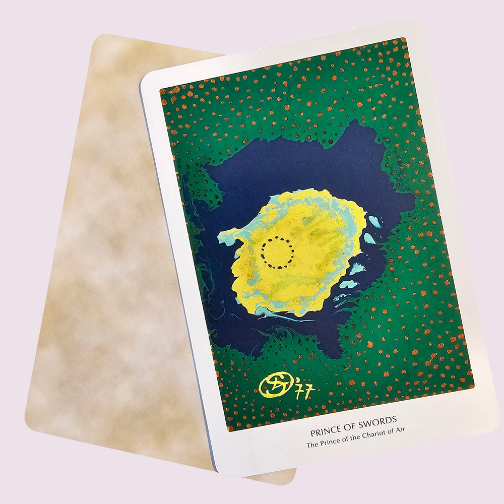 Card with a colorful design on a textured surface