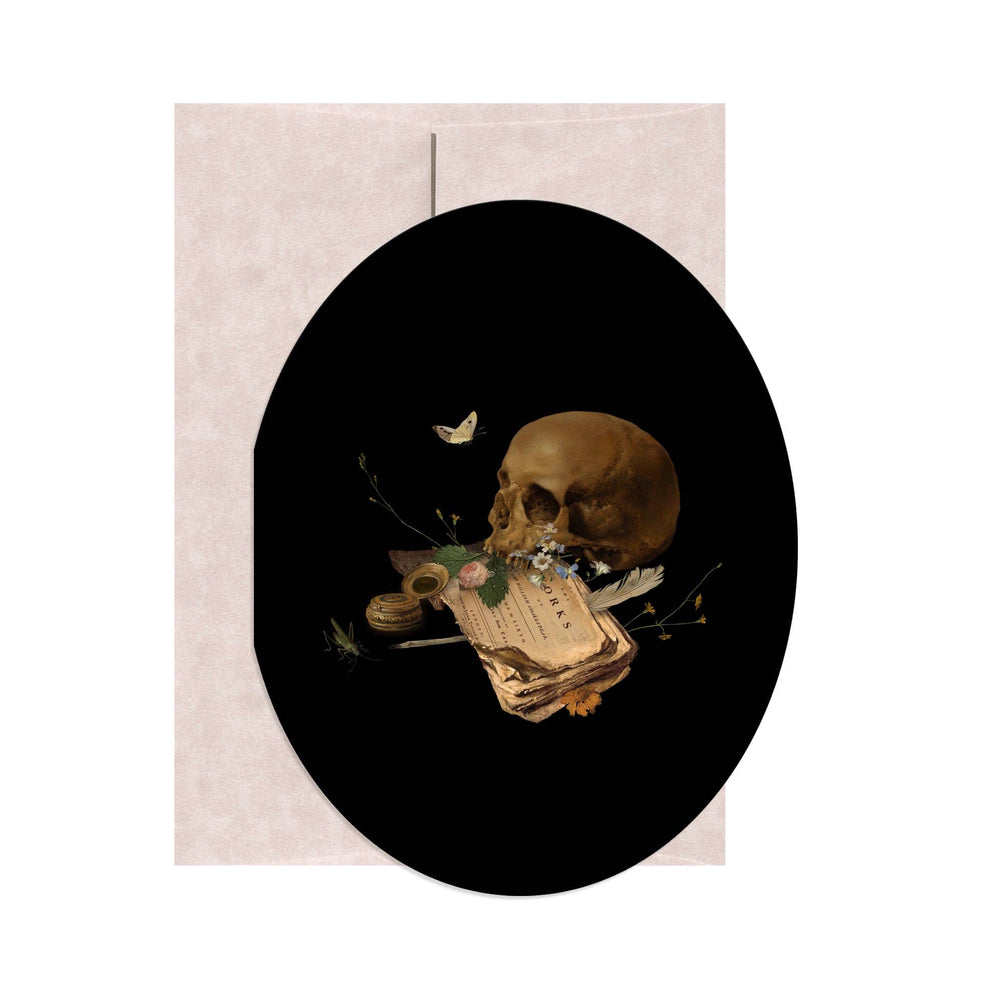 Oval die-cut greeting card featuring a memento mori still life with skull, book, flowers, and butterfly, created in collaboration with HAMNET