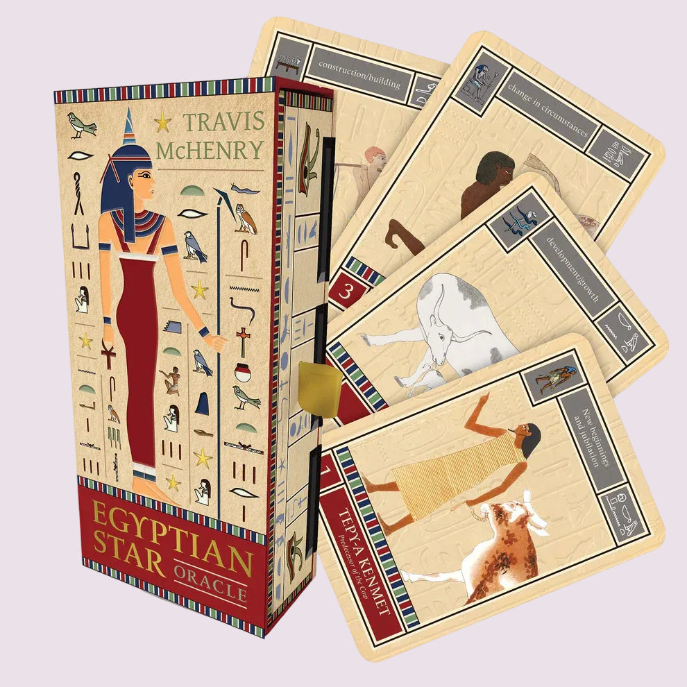Egyptian Star Oracle cards by Travis McHenry with illustrations of ancient Egyptian figures and symbols.