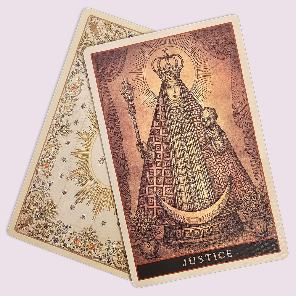 Codex The Art of Divination “Justice” card featuring crowned figure holding skull and torch in intricate symbolic style