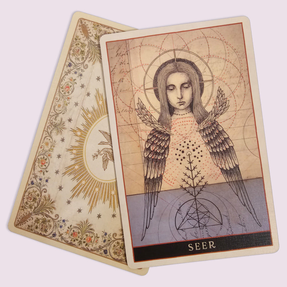 Codex The Art of Divination “Seer” card featuring winged figure with geometric halo and sacred diagram background