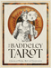 Cover of 'The Baddeley Tarot' with a stylized illustration of a figure holding a moon face.