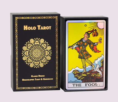 Holo Tarot deck box by Vieux Monde displayed beside The Fool card, showcasing classic Rider–Waite–Smith artwork with a luminous holographic finish.