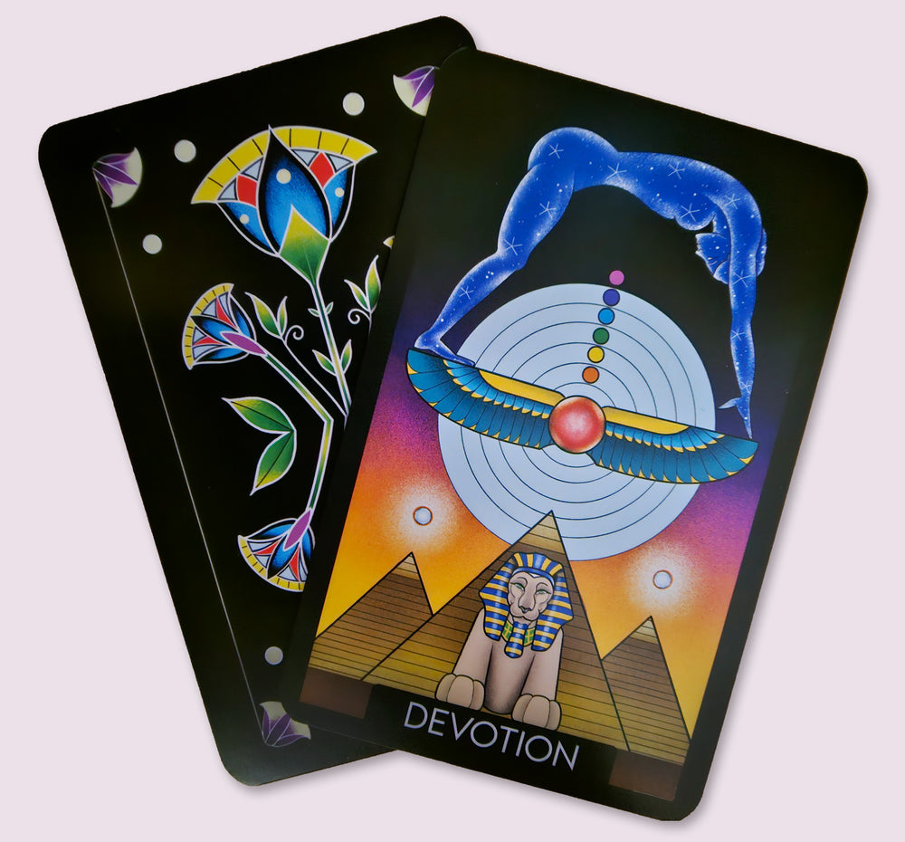Devotion card from the Initiates Oracle featuring pyramids, the Sphinx, winged solar symbolism, and a cosmic devotional figure