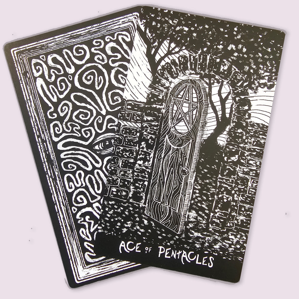 Night Visions Tarot Ace of Pentacles card featuring a moonlit doorway with pentacle symbolism in black and white artwork