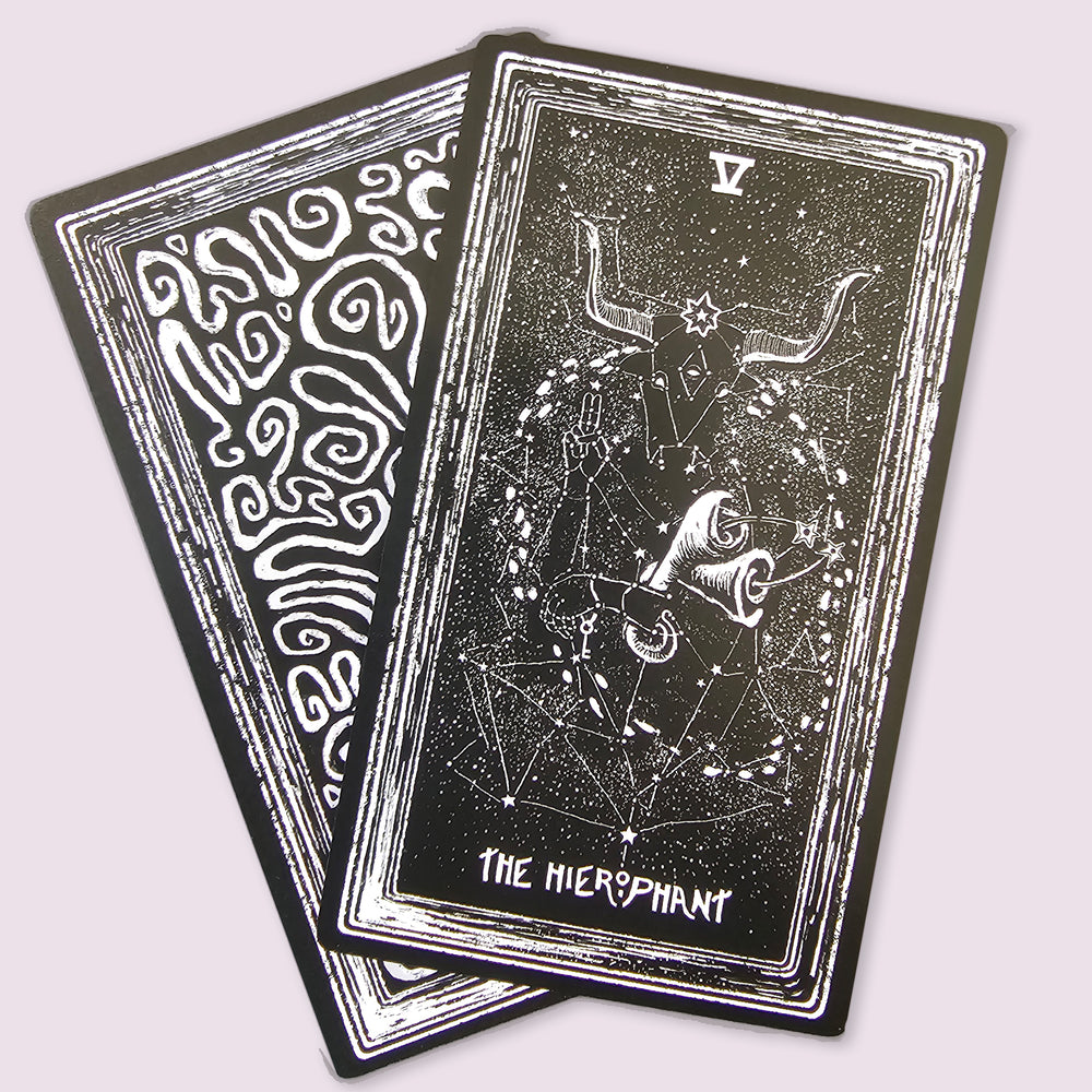 Night Visions Tarot The Hierophant card showing a horned figure with constellations and sacred symbols in dark monochrome style