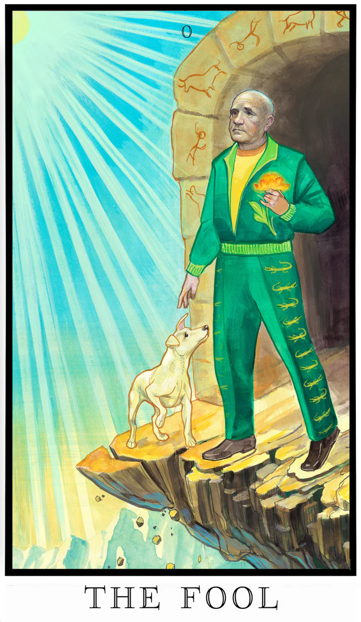 The Fool tarot card from The Modern Queer Tarot featuring Jean Genet, illustrated standing at a cliff’s edge with a small dog, bathed in radiant light and symbolizing beginnings, risk, and freedom.
