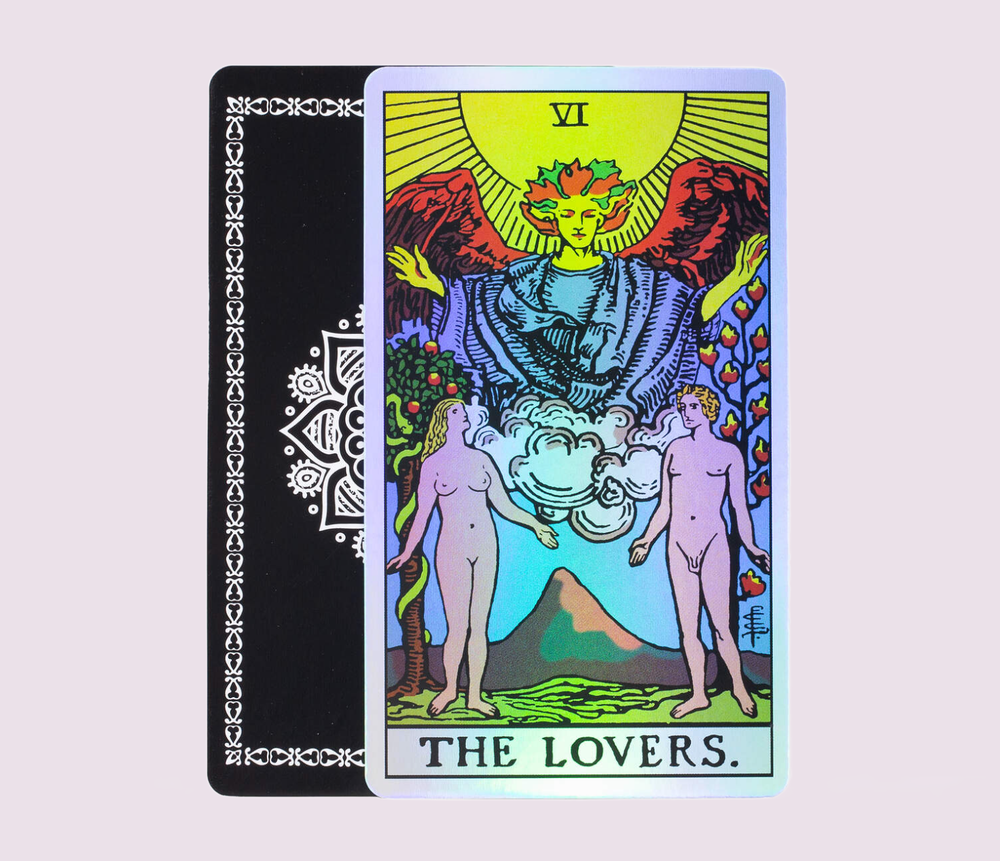 The Lovers card from the Holo Tarot, displaying classic Rider–Waite–Smith artwork with radiant holographic accents and shimmering card borders.