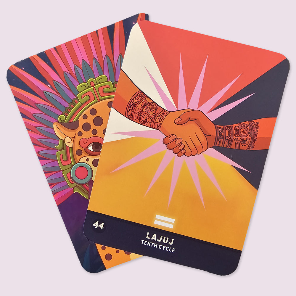 Lajuj, the Tenth Cycle card from The Mayan Oracle featuring two tattooed hands joined in ritual handshake beneath radiant sacred light.