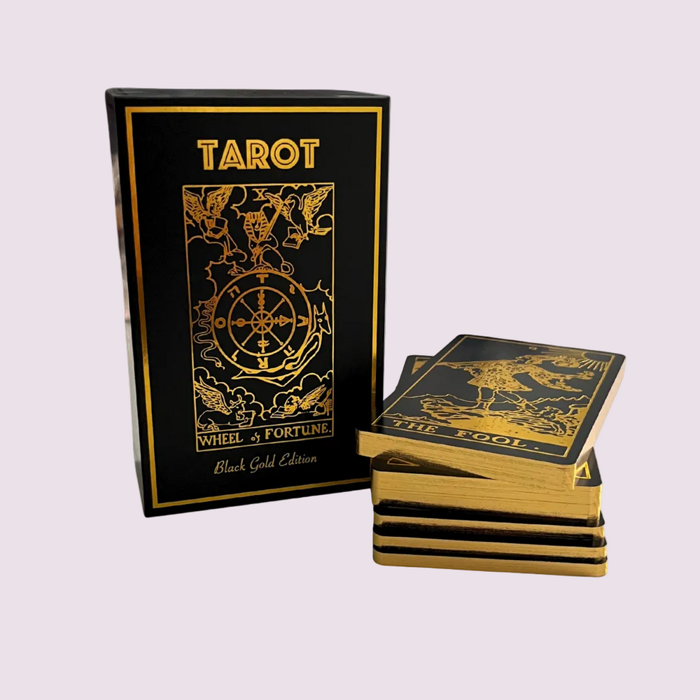 Black and gold tarot card set with 'Wheel of Fortune' design on a white background