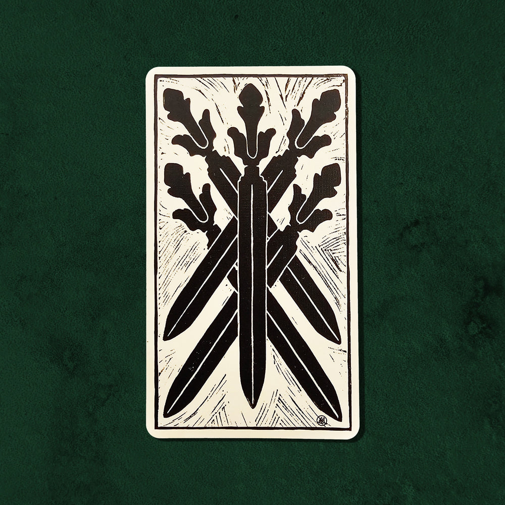 Five of Swords (Cinq d'Épées) card from the Lux Tarot, showing five crossed swords in a striking hand-carved linocut composition